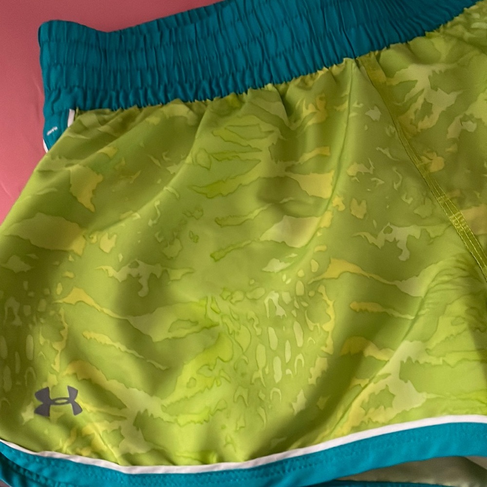 Green and blue under armor athletic shorts
